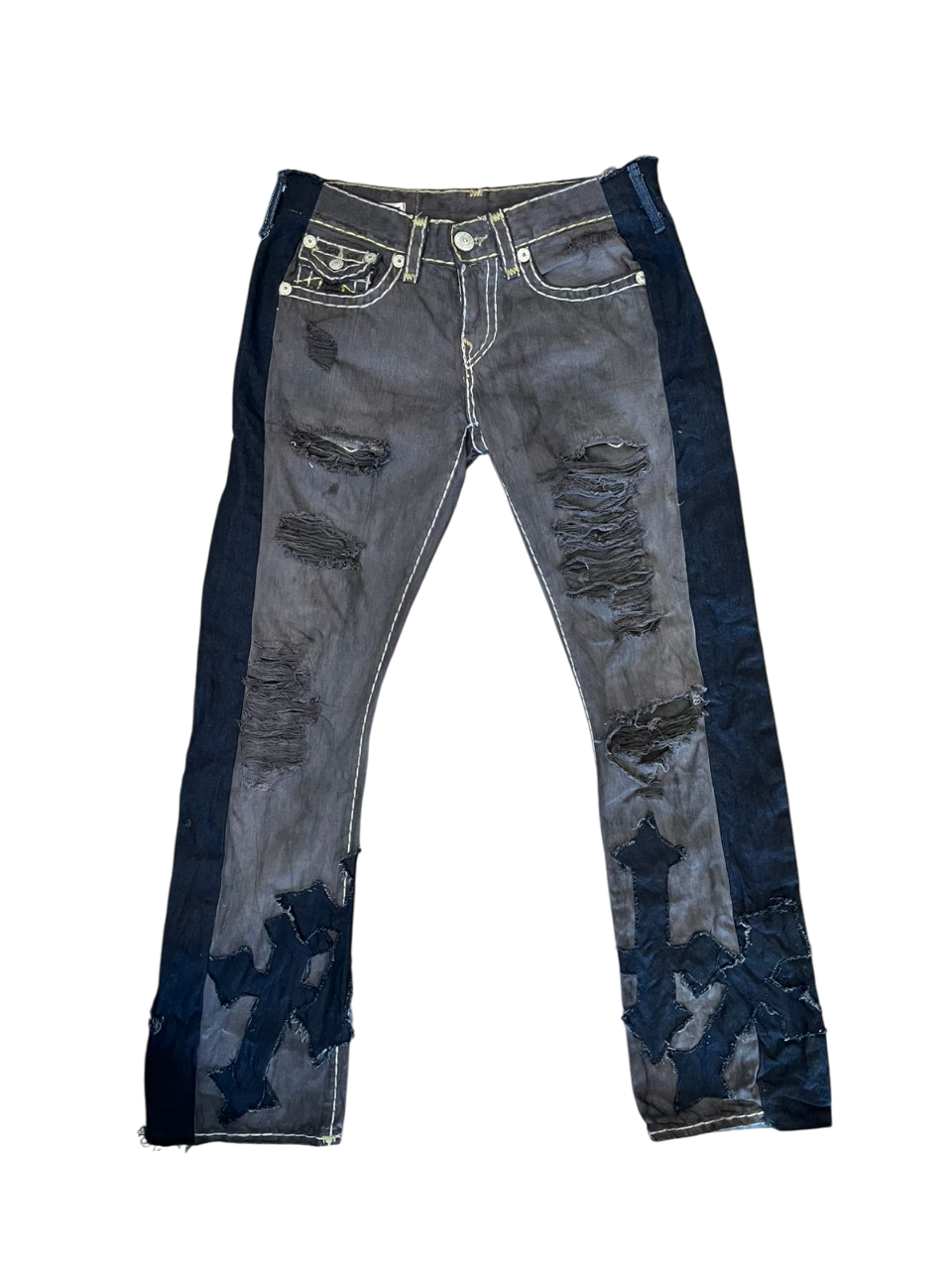 Triple black jeans with crosses